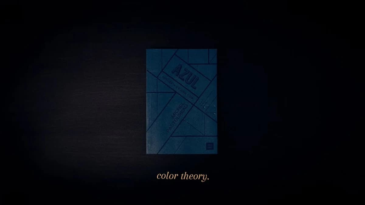 A blue-lit composition with the words color theory beneath it
